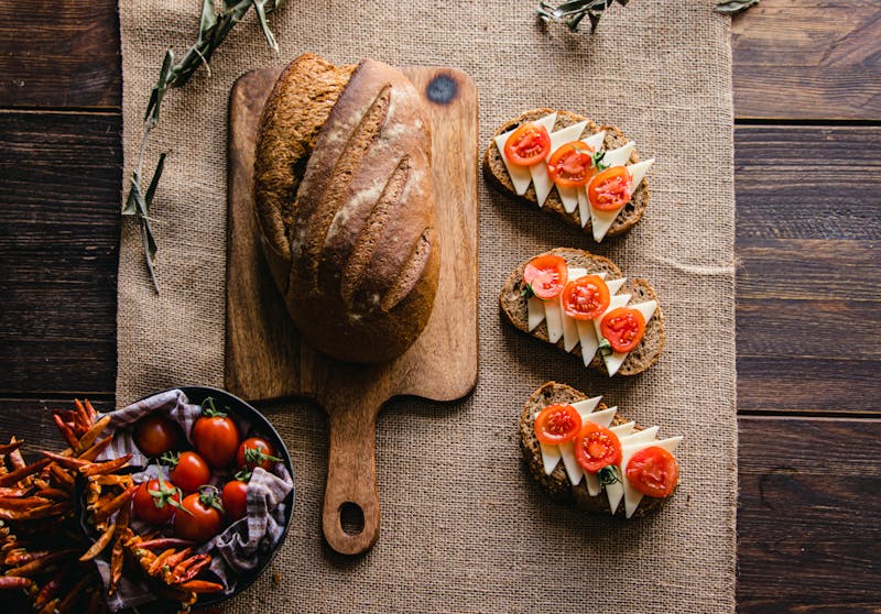 Golden garlic knots basket served with marinara dipping sauce